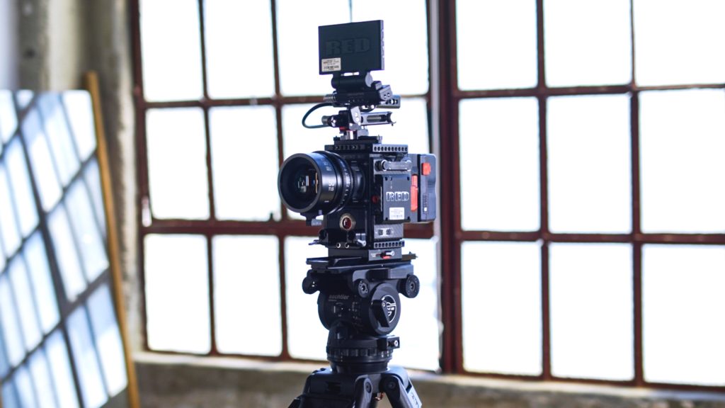 video camera on video tripod