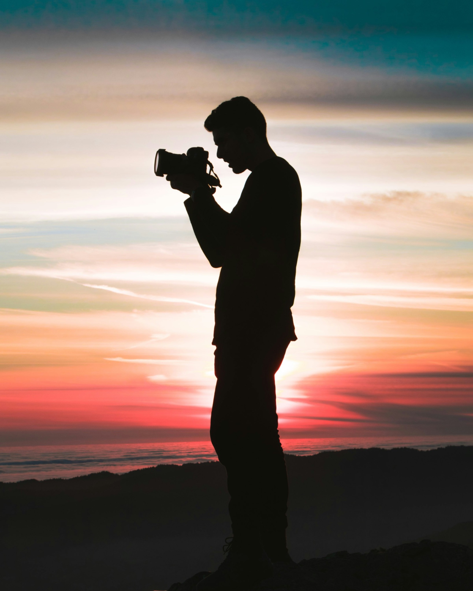 Silhouette of photographer taking pictures