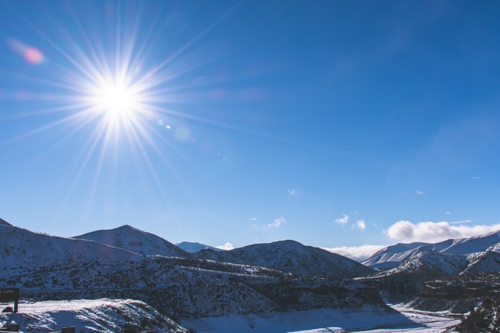 snow capped mountain under blue sky