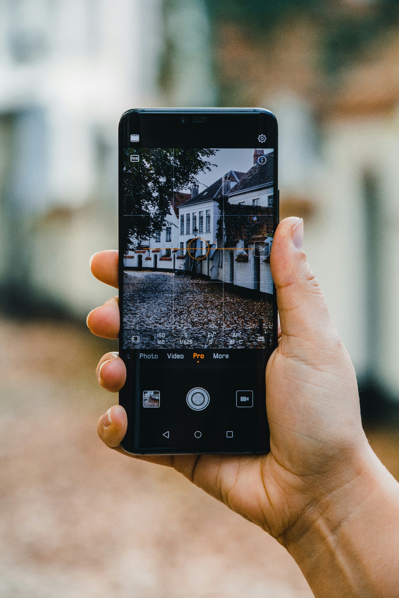 Someone taking pictures on a smartphone