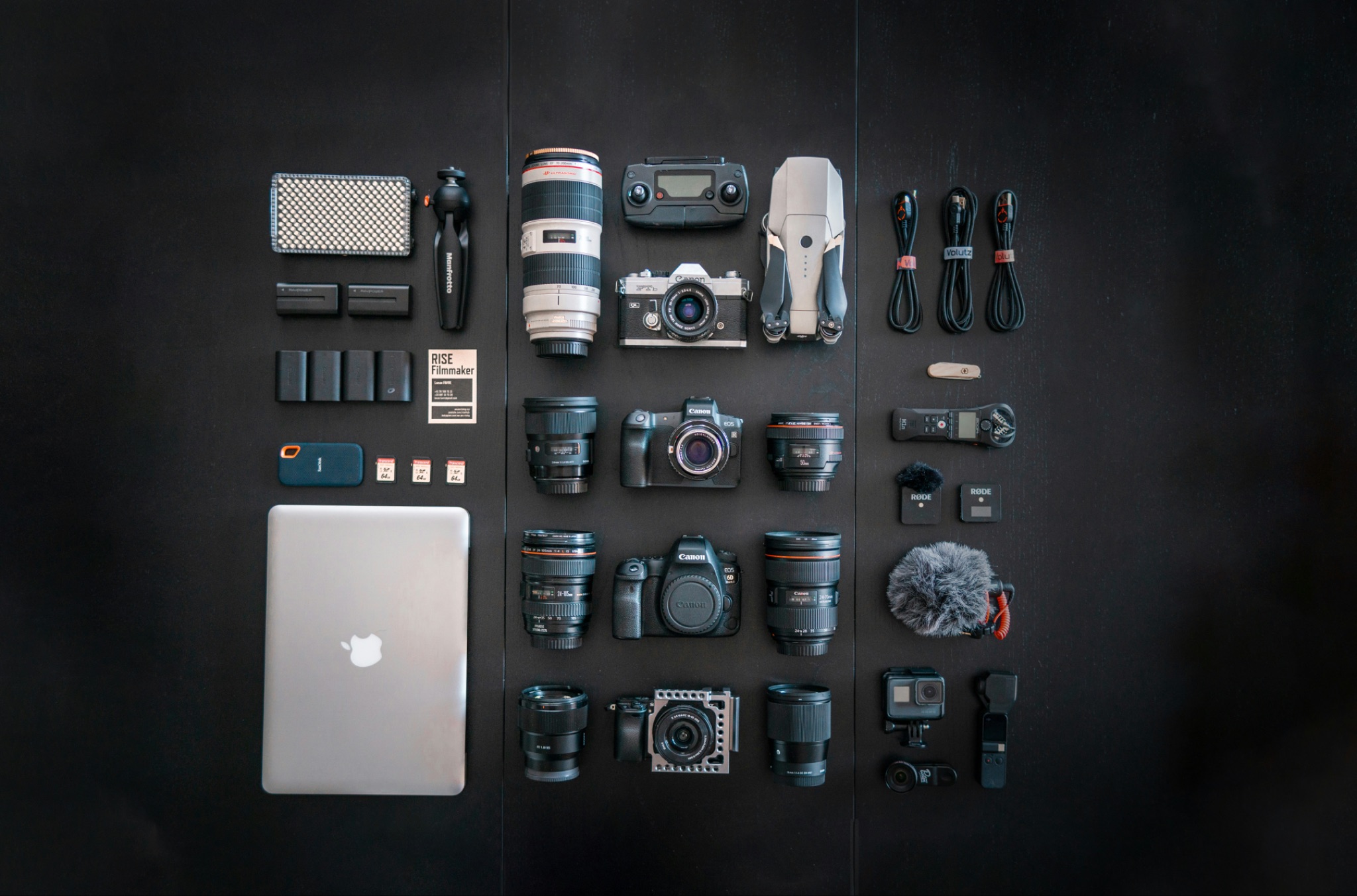 Top down view of large selection of photography equipment