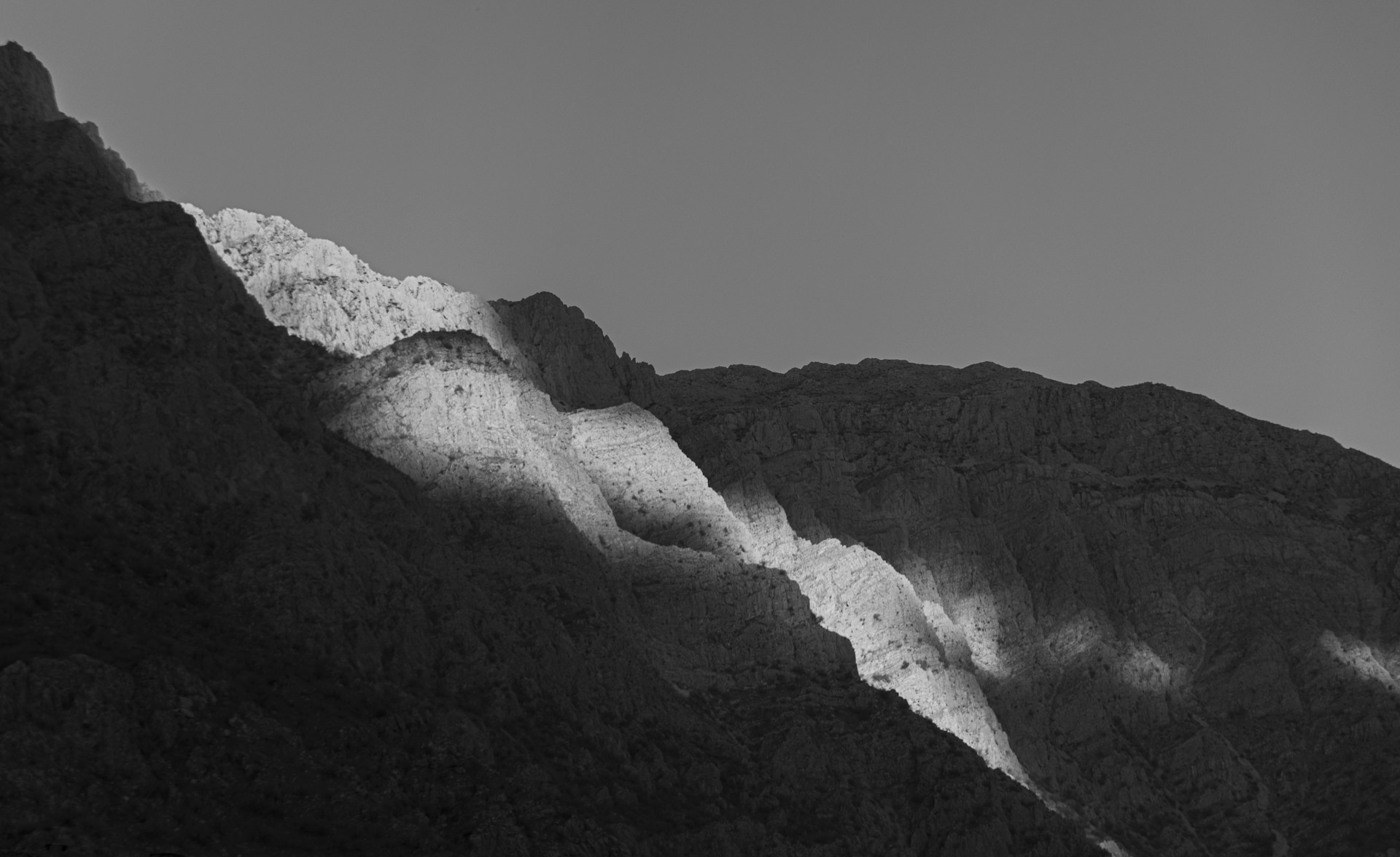 Closeup Of Mountains In Black And White Transformed By Light, Shapes, Forms & Textures Closeup Of Mountains In Black And White Transformed By Light, Shapes, Forms & Textures