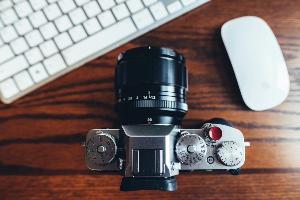 Top plate of modern mirrorless camera showing ISO dial