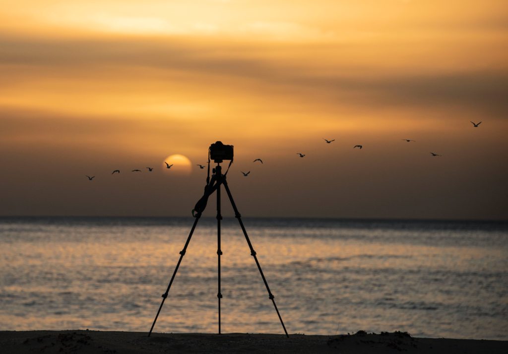 Tripod in a sunset