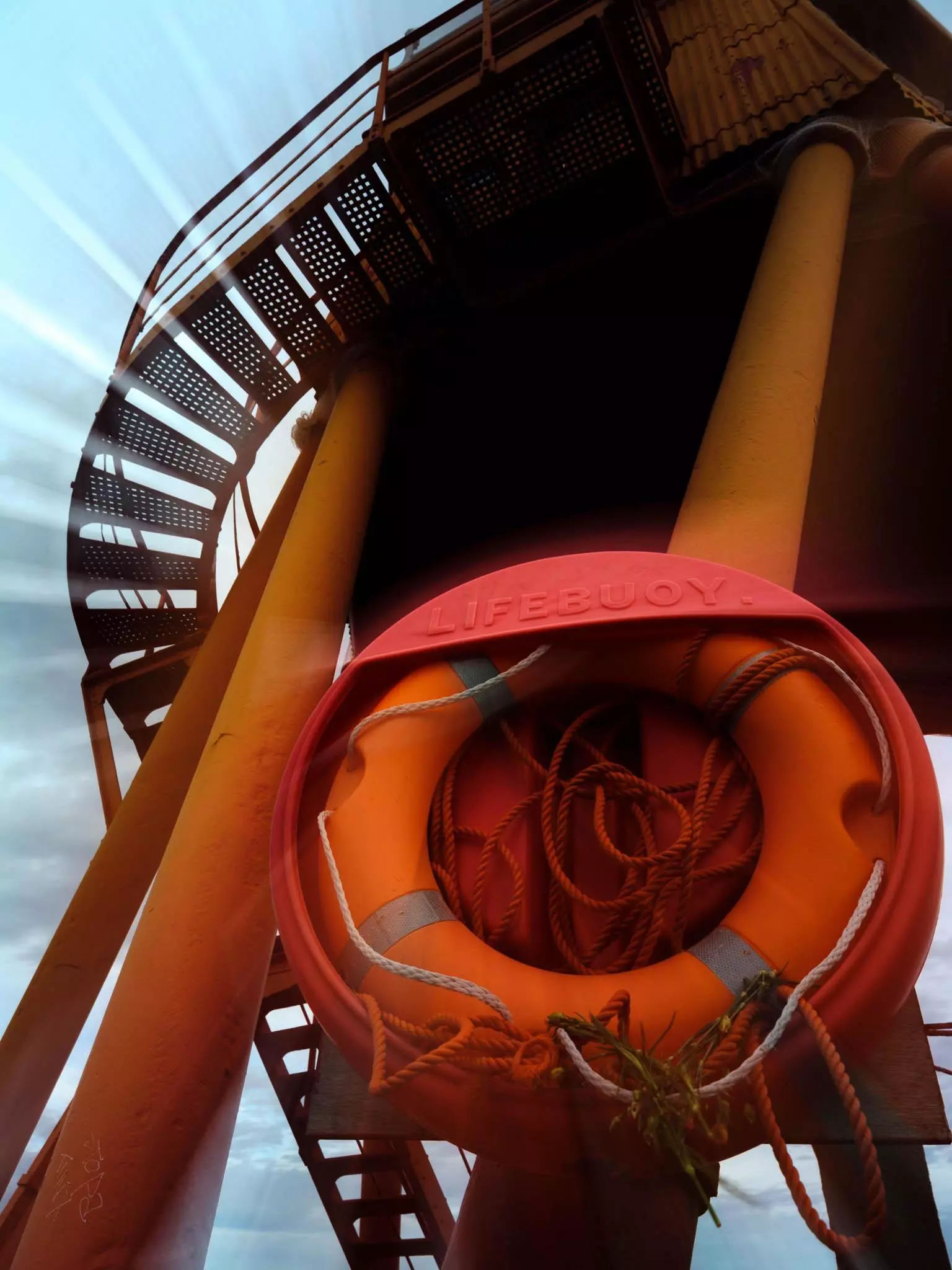 Unintentional camera movement in a photo of Cred life ring on Herd Groyne Lighthouse in South Shields