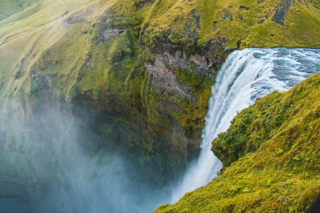 Waterfall from the top falling into an abyss