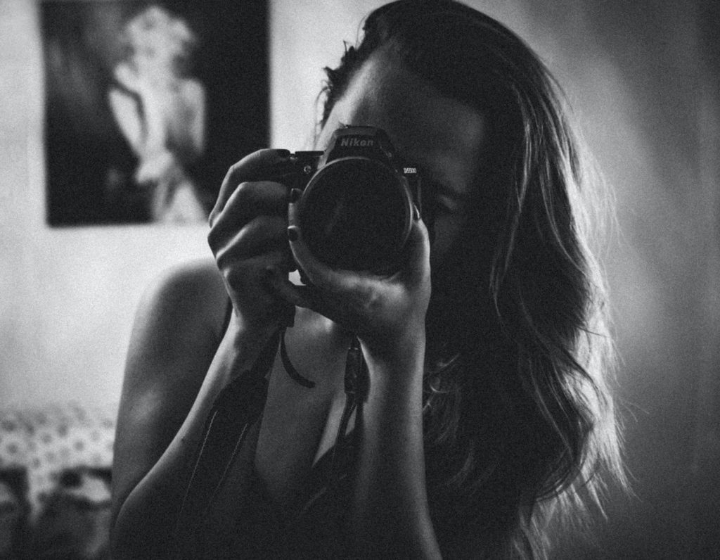 woman holding camera