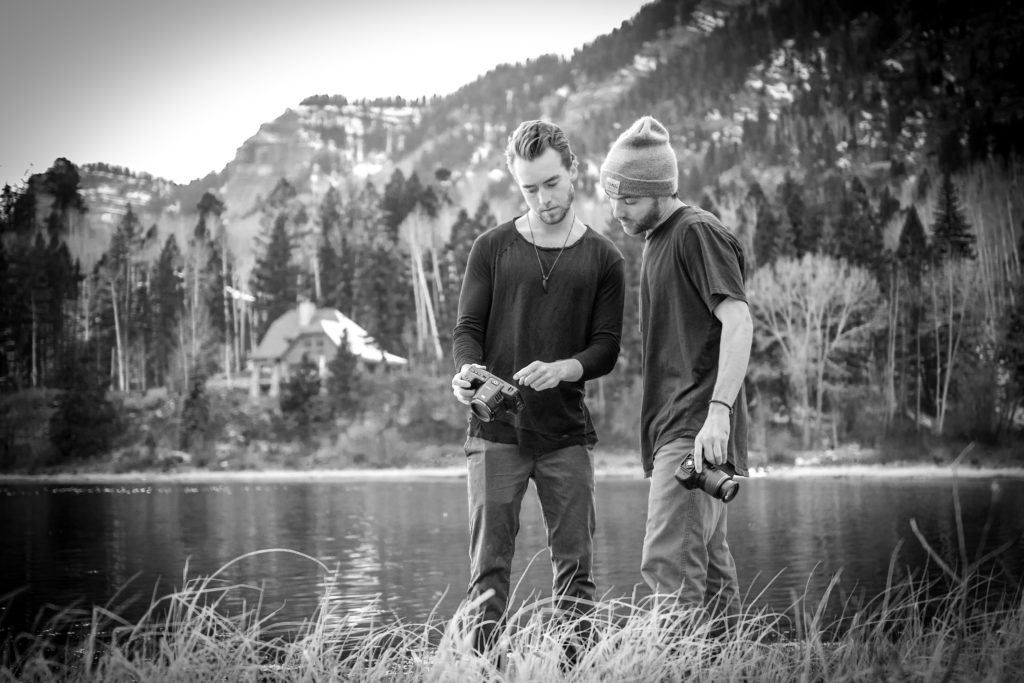 Thotographers looking at shots on camera